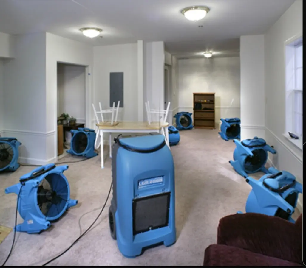 Air movers and dehumidifier setup for Water Damage Restoration in Bedminster